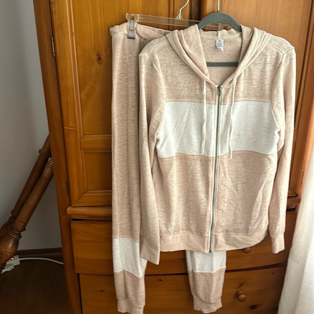 Very nice in great condition Alternative jacket & matching pants in peach /white